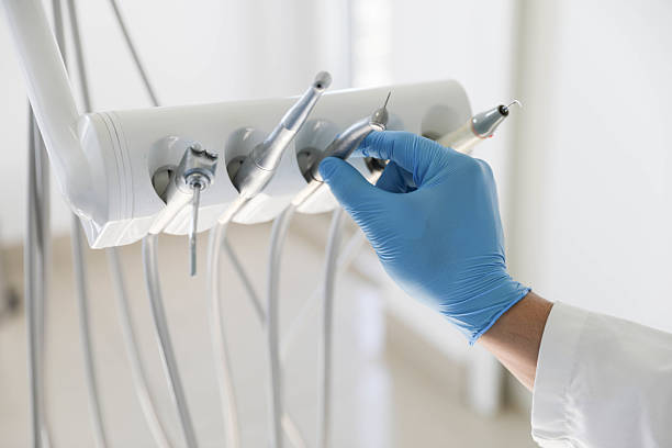 Professional Root Canal Treatment technician working in Henryetta, OK
